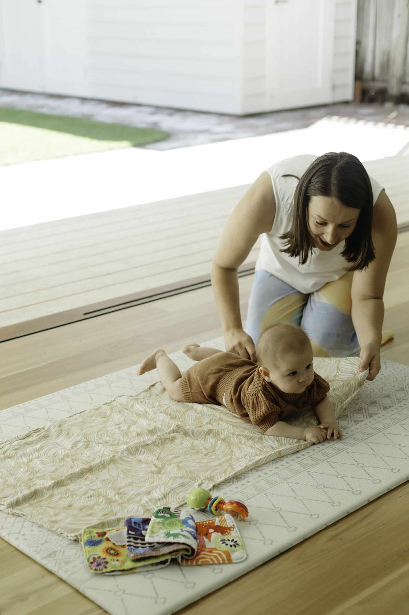 Preroller094 Physiotherapist at Western Kids Health with baby learning how to crawl